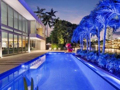 Set on prestigious Rio Vista Boulevard, this modern estate