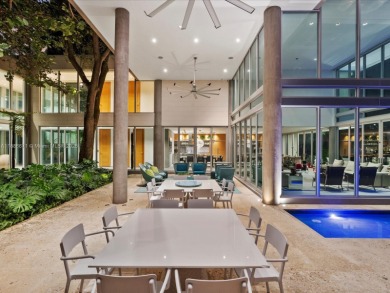 Set on prestigious Rio Vista Boulevard, this modern estate