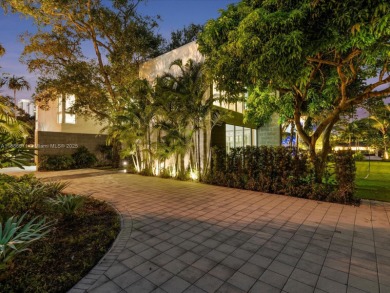 Set on prestigious Rio Vista Boulevard, this modern estate