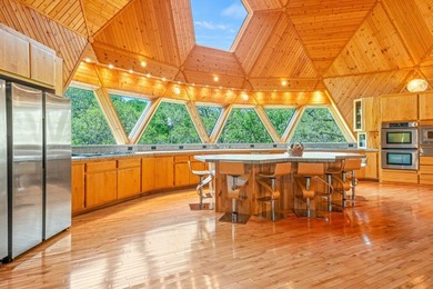 Welcome to this one-of-a-kind, energy-efficient, geodesic custom