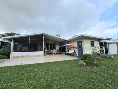 Welcome to this beautifully maintained 1990 double-wide