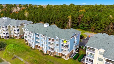 Top floor corner 3-bedroom condominium at Magnolia Pointe. These