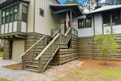 This stunning 3-bedroom, 3.5-bathroom home, designed by renowned