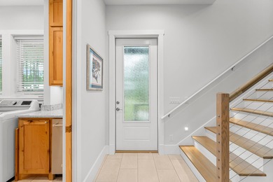 This stunning 3-bedroom, 3.5-bathroom home, designed by renowned