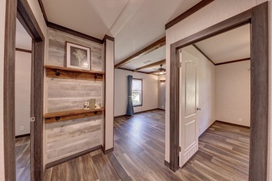 Enjoy country living and no city taxes minutes from town. This