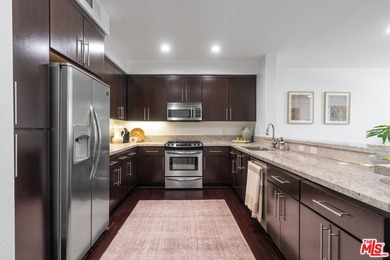 Experience the best of Toluca Lake living in this beautifully