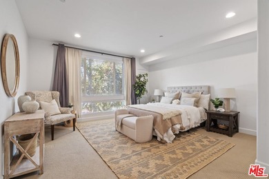 Experience the best of Toluca Lake living in this beautifully