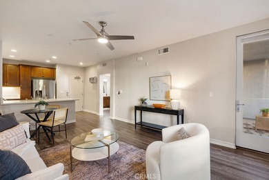 Welcome to Unit 312 at Mura, a sought-after condominium