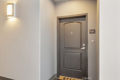 Welcome to Unit 312 at Mura, a sought-after condominium