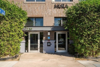 Welcome to Unit 312 at Mura, a sought-after condominium