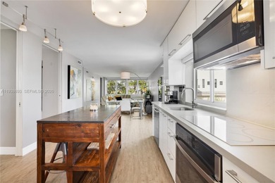 Live large in this gorgeously updated, two bedroom, two full