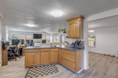 This intracoastal access canal front home presents endless