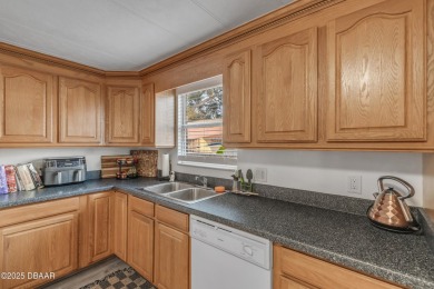 This intracoastal access canal front home presents endless