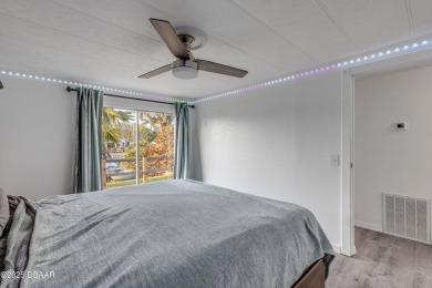 This intracoastal access canal front home presents endless