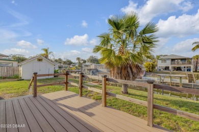 This intracoastal access canal front home presents endless
