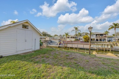 This intracoastal access canal front home presents endless