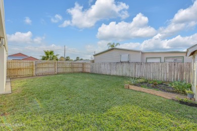 This intracoastal access canal front home presents endless