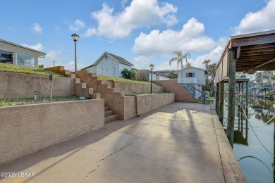 This intracoastal access canal front home presents endless