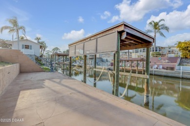 This intracoastal access canal front home presents endless