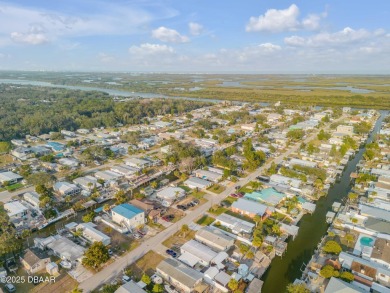 This intracoastal access canal front home presents endless