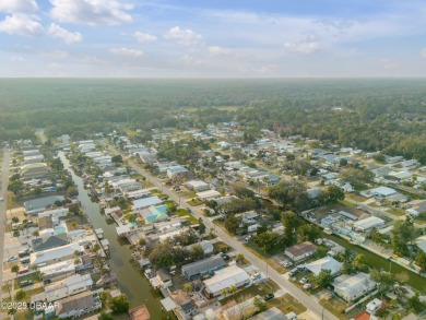 This intracoastal access canal front home presents endless