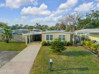 This intracoastal access canal front home presents endless