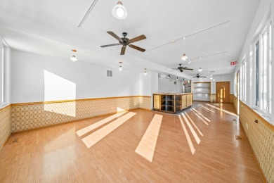 This real estate property comprises a three-unit building