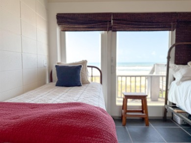 This charming ground level house on St. George Island offers the