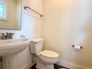 This charming ground level house on St. George Island offers the