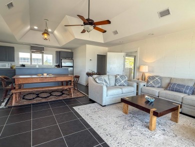 This charming ground level house on St. George Island offers the