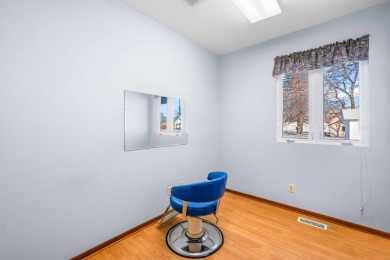 This real estate property comprises a three-unit building