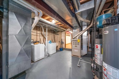 This real estate property comprises a three-unit building