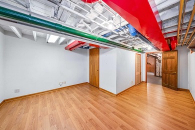 This real estate property comprises a three-unit building