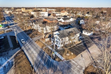 This real estate property comprises a three-unit building