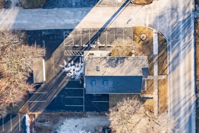 This real estate property comprises a three-unit building