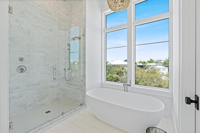 PRICED TO SELL NEW CONSTRUCTION! GULF VIEW GOODNESS ON THIS WEST