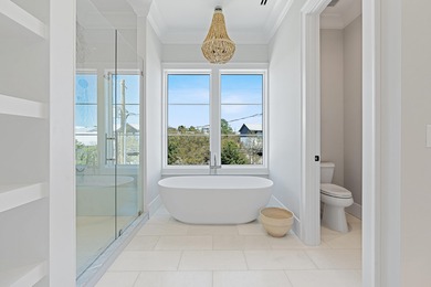 PRICED TO SELL NEW CONSTRUCTION! GULF VIEW GOODNESS ON THIS WEST