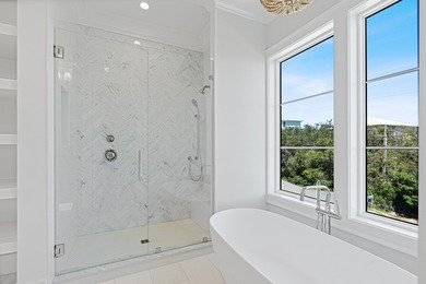 PRICED TO SELL NEW CONSTRUCTION! GULF VIEW GOODNESS ON THIS WEST