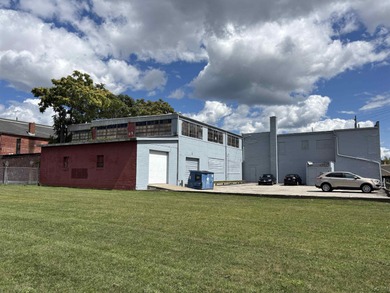 Fantastic corner location in downtown Adrian with its own