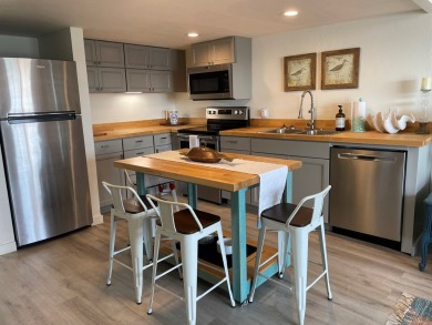 Check out this beautifully remodeled, coveted LOFT  condominium