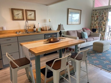 Check out this beautifully remodeled, coveted LOFT  condominium