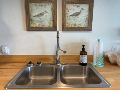 Check out this beautifully remodeled, coveted LOFT  condominium