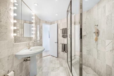 Welcome to Residence 201N at the coveted, private, and exclusive