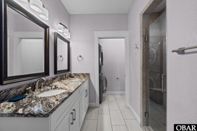 A stunning oceanfront estate located in the heart of Kill Devil