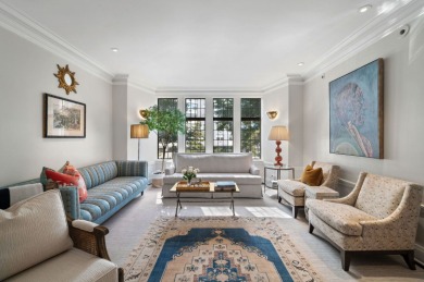 Experience refined East Lakeview living in this impeccably