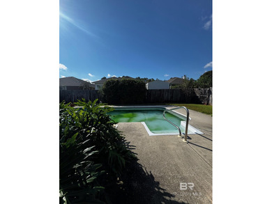 Welcome this charming coastal retreat with salt water pool in