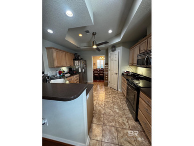 Welcome this charming coastal retreat with salt water pool in