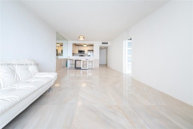 Step into luxury in this fully renovated 1 bed + den, 1.5 bath