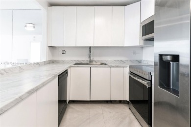 Step into luxury in this fully renovated 1 bed + den, 1.5 bath
