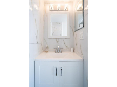 Step into luxury in this fully renovated 1 bed + den, 1.5 bath